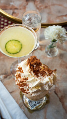 Chilled coffee and ice cream topped with whipped cream or Schlag. A delightful fusion drink for...