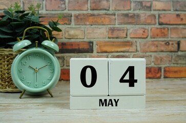 Wooden Calendar Showing the Date of May 4th. Day 4 of May month