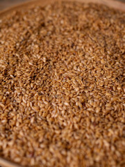 Organic golden flaxseed, linseed grains. Superfood high in fiber.