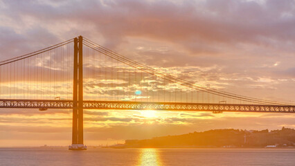 Lisbon city sunrise with April 25 bridge timelapse