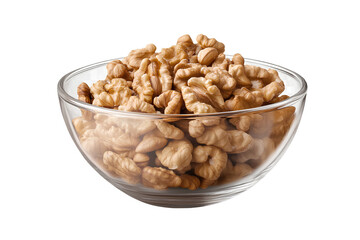 Fototapeta premium Walnuts in a glass bowl, isolated on a transparent background