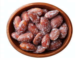 Obraz premium candied almonds in a wooden bowl, isolated on a white background with a clipping path, top view