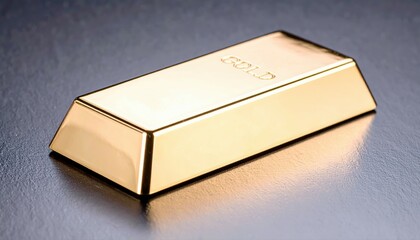 Close-up of a shiny gold bar on a smooth dark surface showing reflections and detailed metallic texture with a minimalist background