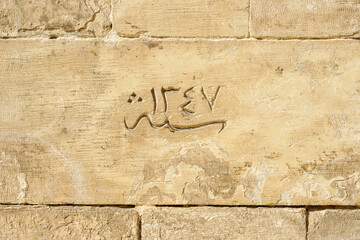 1347 Hijri date carved on a stone in historical mosque Cairo Egypt