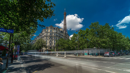 Eiffel Tower behind historic buildings in Paris timelapse hyperlapse, France