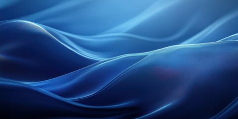 Obraz premium Shimmering blue fabric waves capture the essence of tranquility and elegance in soft flowing textures