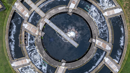 Aerial view westewater treatment tank with wastewater, Circle circular water clarifier cleaning...