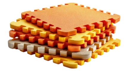 Colorful Interlocking Foam Tiles: A stack of colorful foam tiles, in shades of orange, yellow, and gray, are showcased with intricate interlocking edges.