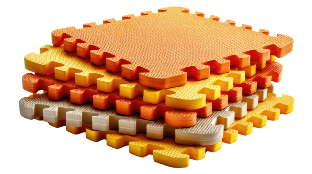Colorful Interlocking Foam Tiles: A stack of colorful foam tiles, in shades of orange, yellow, and gray, are showcased with intricate interlocking edges.