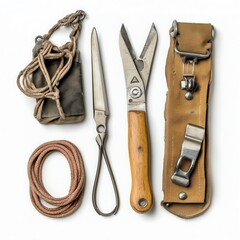 Vintage sewing tools including scissors, thread, and a leather pouch on a clean surface