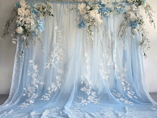 Exquisite floral drapery with a soft blue hue and intricate floral details