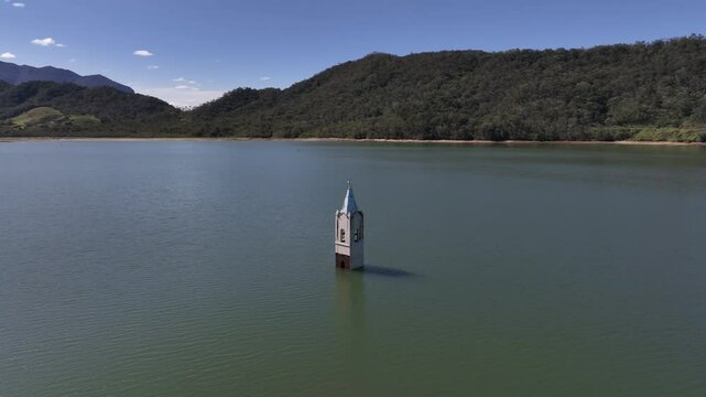 Submerged church tower in Sideropolis, Nova Veneza, Santa Catarina. Flooded church. Aerial view.