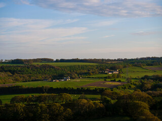 Obraz premium Lush green farmland in Yorkshire in Summer clear blue skies