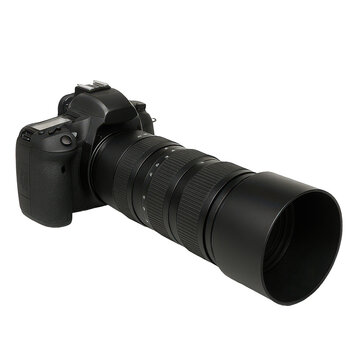 Fototapeta Modern digital camera with a long zoom lens and protective hood, ready for capturing distant subjects.