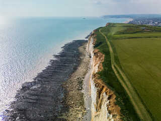 Aerial drone view over the famous, white cliffs of The Seven Sisters Dover, south England.