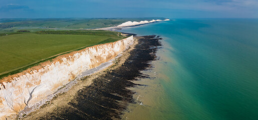 Aerial drone view over the famous, white cliffs of The Seven Sisters Dover, south England.