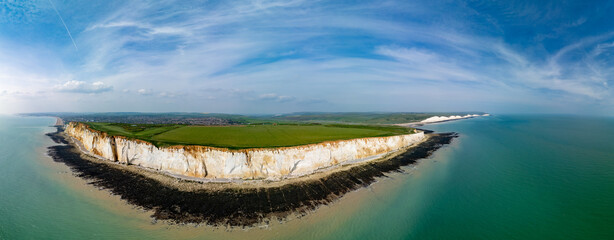 Aerial drone view over the famous, white cliffs of The Seven Sisters Dover, south England.