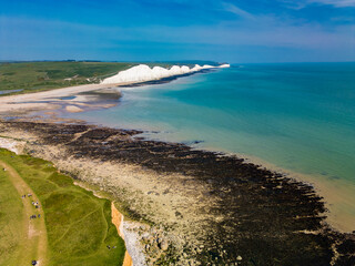 Aerial drone view over the famous, white cliffs of The Seven Sisters Dover, south England.