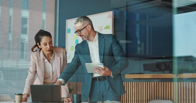 Business people, tablet and cooperation in office, laptop and digital app for online tax schedule. Employees, man and woman in workplace, research and accounting with investment, planning or internet