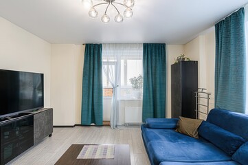 standard interior apartment. living room with sofa