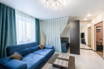 standard interior apartment. living room with sofa