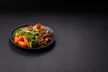 Food bowl with tofu, quinoa, broccoli and carrots, microgreens