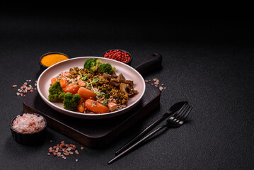 Food bowl with tofu, quinoa, broccoli and carrots, microgreens