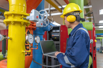 Maintenance technician at a heating plant,Petrochemical workers supervise the operation of gas and...