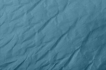 Obraz premium Abstract wrinkled blue crumpled paper texture background