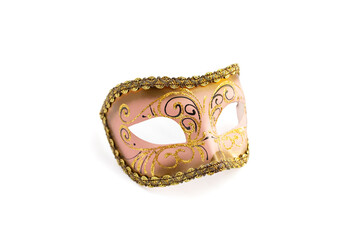 Pink colored carnival mask with golden glitter decorations, isolated on white background