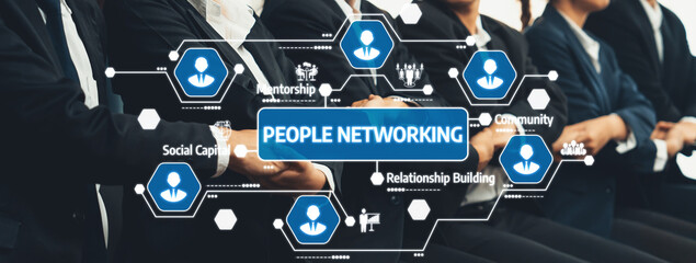 Image depicts business professionals engaged in networking, emphasizing collaboration, mentorship and community building essential for career growth and success in professional settings. Amity