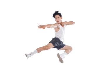 portrait of muscular asian guy in sportswear high jump posing on white background