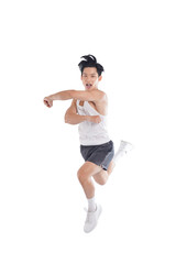portrait of muscular asian guy in sportswear high jump posing on white background