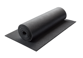 A rolled black yoga mat placed on a wooden floor. with soft natural light illuminating the scene. suggesting a peaceful environment for exercise or meditation
