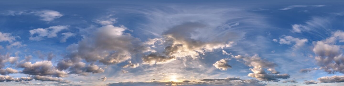 seamless cloudy blue evening sky hdri panorama 360 degrees angle view with zenith and beautiful clouds for use in 3d graphics or game development as sky dome or edit drone shot