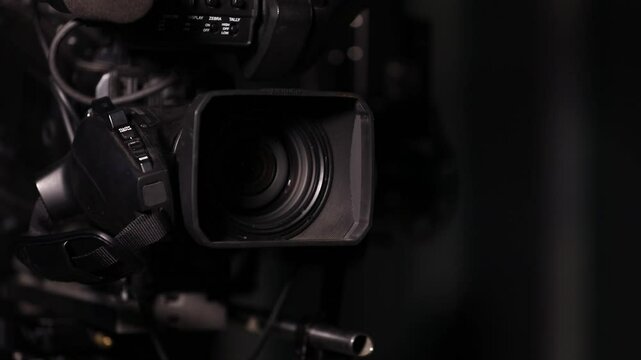 Camera on a crane in front of a blue LED wall, inside of the studio. Perfect for music videos, stage performance, and television production.