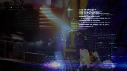 male technician operating blowtorch with blue flame in factory bay displaying floating code overlay - Powered by Adobe