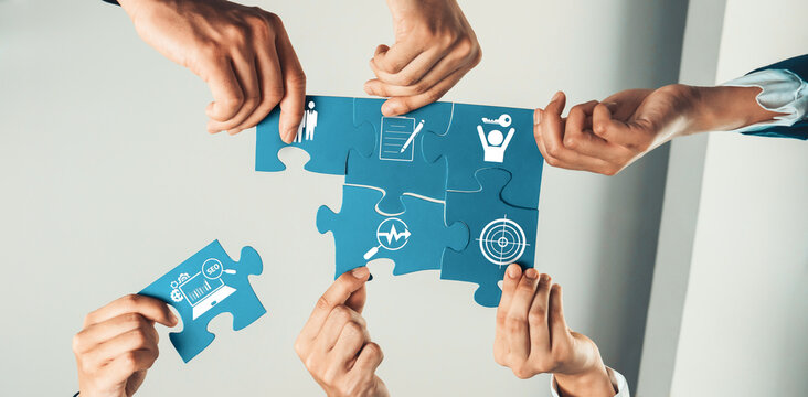 Top view panorama banner of business team assembling jigsaw puzzle over table symbolize business partnership and collective teamwork for HR recruitment and job seeker background. Shrewd Amity