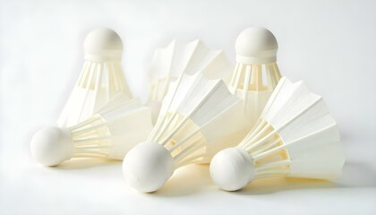 Fototapeta premium white badminton shuttlecocks in pile on white background