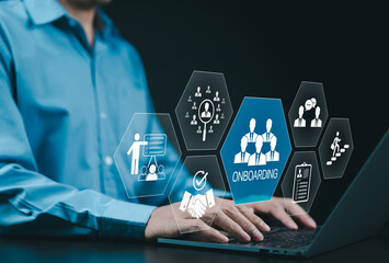 Onboarding new employee process concept. A businessman using laptop with icons representing...