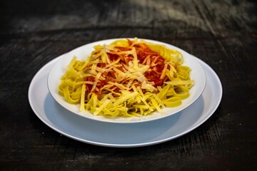 Authentic fettuccine or tagliatelle with tomato sauce and grated parmesan. real food