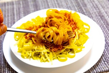 Authentic fettuccine or tagliatelle with tomato sauce and grated parmesan. real food