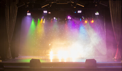 stage light with colored spotlights and smoke, concert and theatre scene 