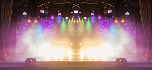 scene, stage light with colored spotlights and smoke