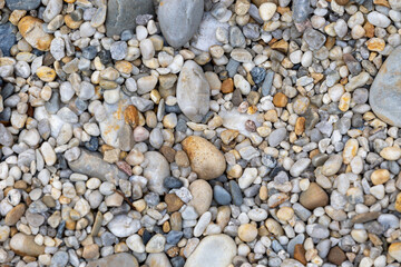Colorful pebbles forming a natural textured background