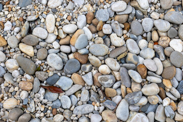 Colorful pebbles forming a natural textured background