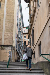 Woman with shopping bags in the old town of Pamplona