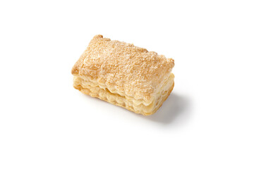 Delicious puff pastry lying on white background