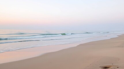 Obraz premium Serene Coastal Dawn: Gentle Waves and Pastel Sands