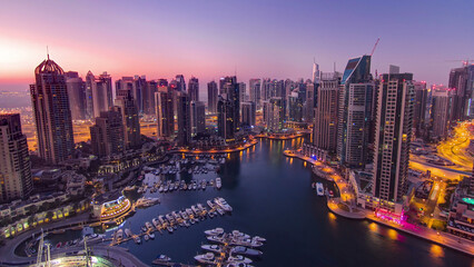 Obraz premium Dubai marina harbor panorama from night to day transition timelapse